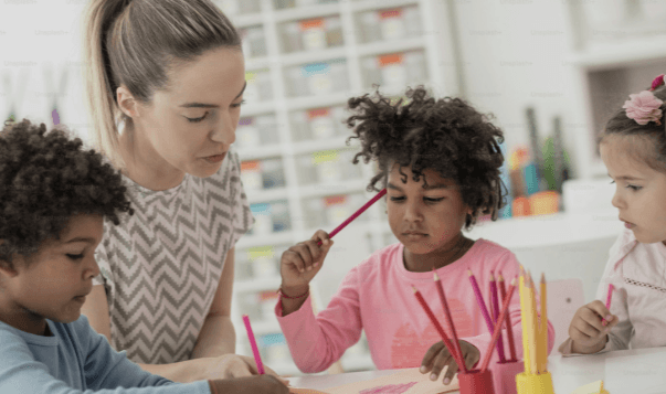 Children working on art projects in a classroom